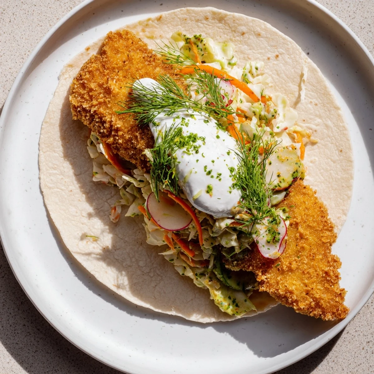 Close-up of crispy pork schnitzel tacos with vibrant sauerkraut slaw, a delightful, flavorful meal.