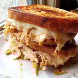 This recipe photo shows a close-up of a perfectly grilled Chili Crisp Honey Chicken Grilled Cheese sandwich.
