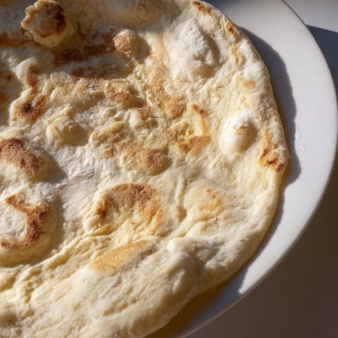 Creamy cottage cheese flatbread, golden and warm, perfect for scooping up dips or enjoying solo.