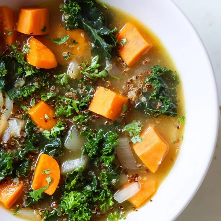 Close-up of vibrant Nourishing Winter Veggie Soup, highlighting colorful vegetables and fluffy quinoa.